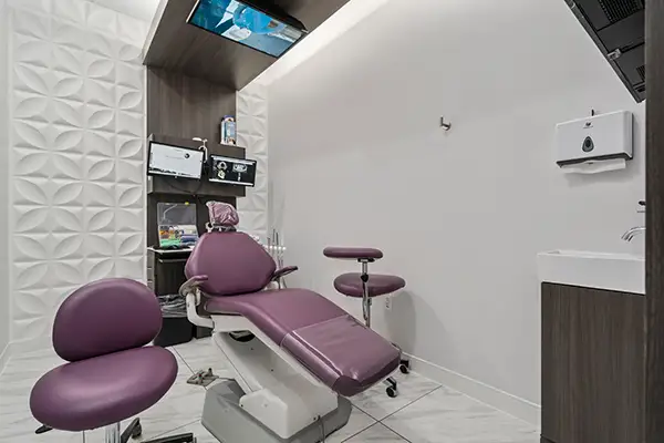 Exam room at Capitol Square Dental, TV on ceiling